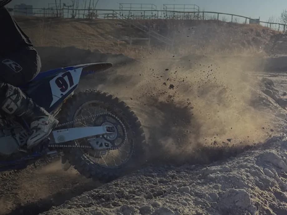 A motocross rider mid-corner, from the clinic's own photography, used across the new site.